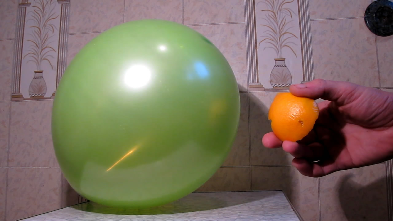 ,     . Orange, balloon and Bunsen burner