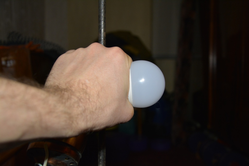 LED-  . LED-lamp and hand