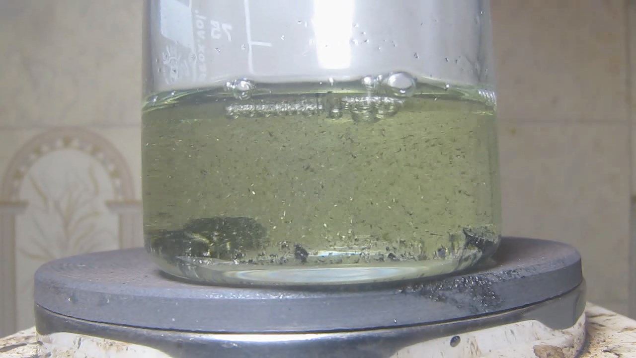 Реакция сплава никеля и фосфора (''фосфид никеля'') с соляной кислотой (кипячение). Reaction of alloy of nickel and phosphorus (''nickel phosphide'') with hydrochloric acid (boiling)
