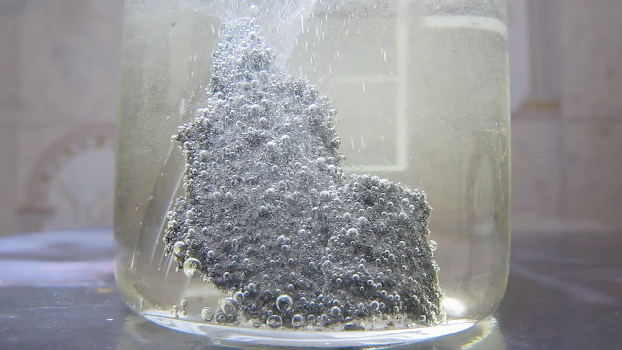      ('' '')   . Reaction of alloy of nickel and phosphorus (''nickel phosphide'') with hydrochloric acid