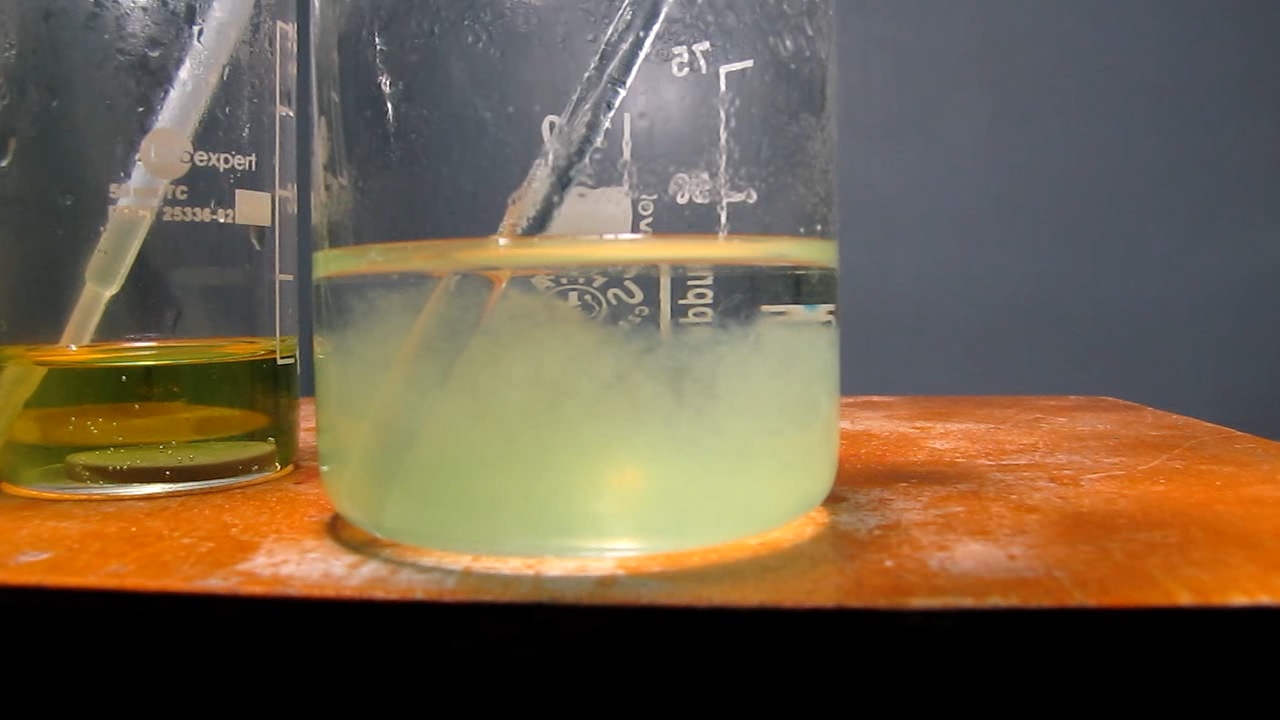 Solution of coin (2 hryvnias) in hydrochloric acid and potassium hydroxide.   (2 )      