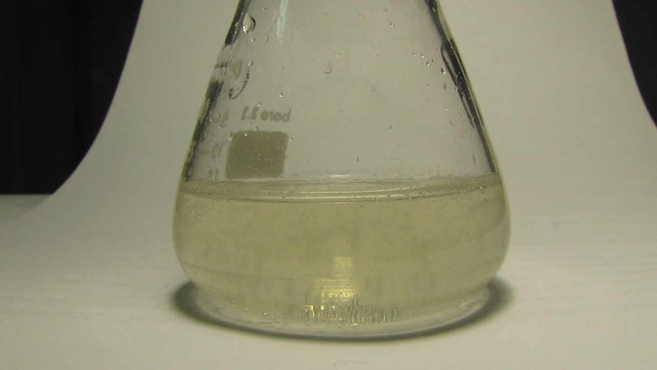 Solution of coin (2 hryvnias) in hydrochloric acid and potassium hydroxide.   (2 )      