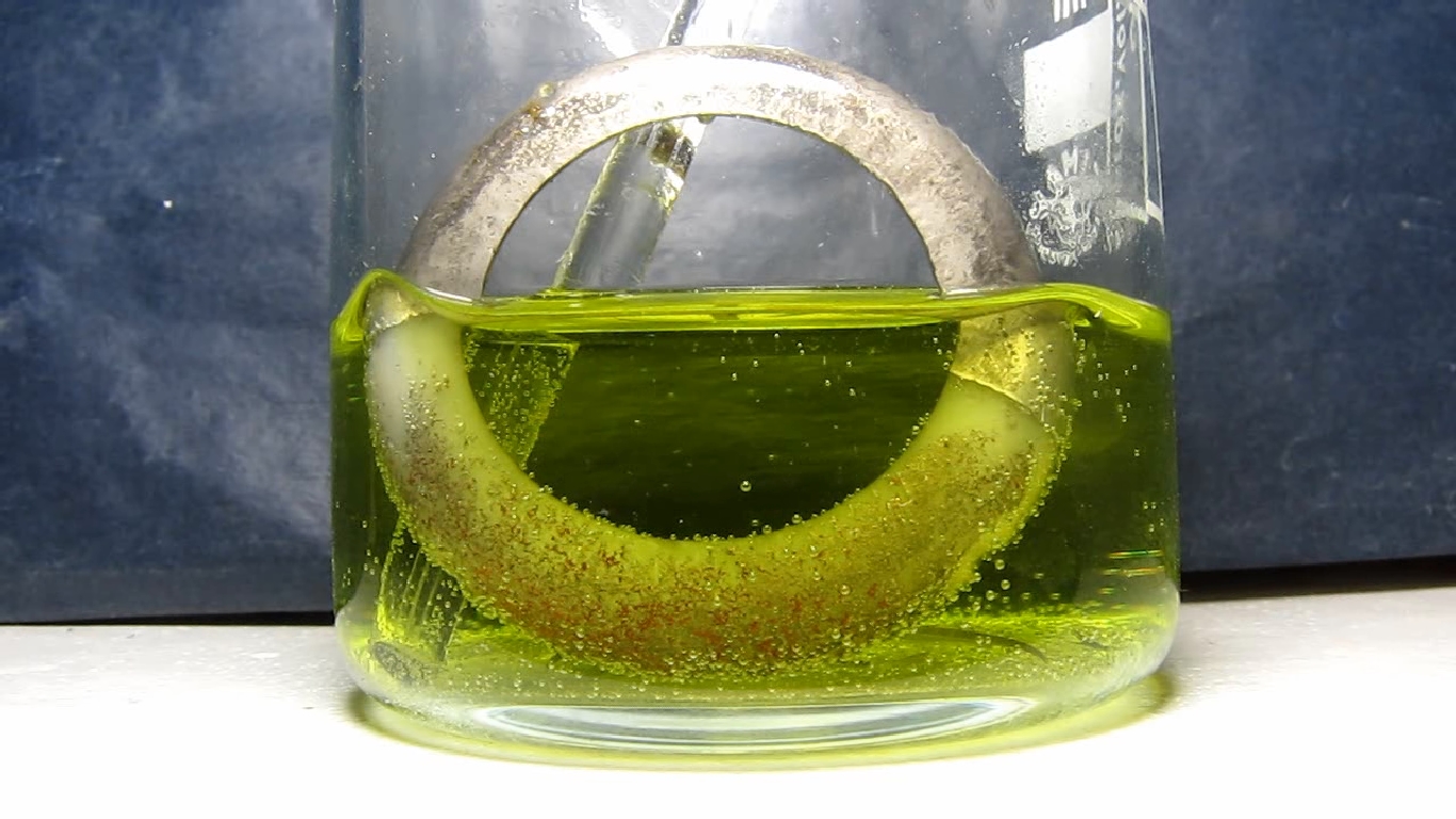 Metallic coating on plastic (copper - nickel - chrome): reaction with hydrochloric acid.     ( -  - ):    