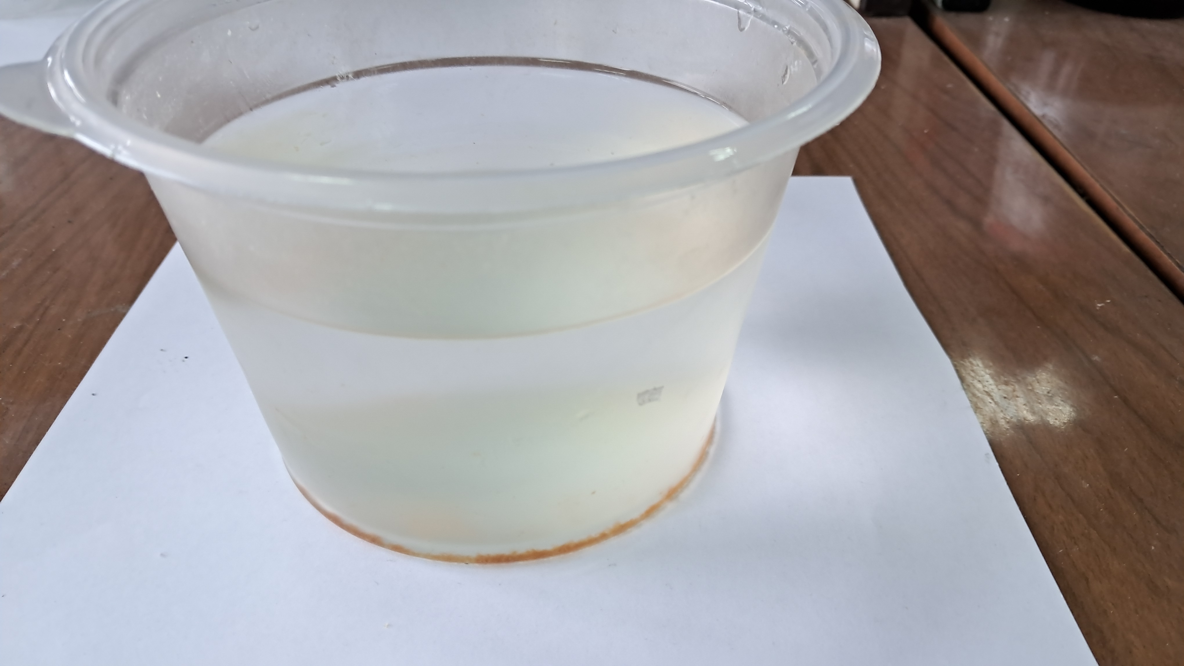 Precipitation of iron(III) hydroxide during freezing of water
