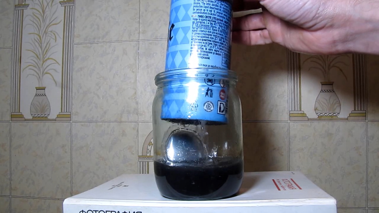 Filtration of alkaline solution (after reaction of aluminium beverage can and potassium hydroxide).    (       )