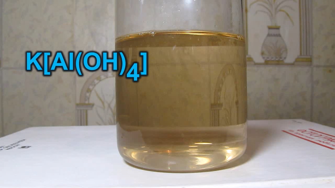 Potassium aluminate K[Al(OH)4] and nitric acid.   K[Al(OH)4]   
