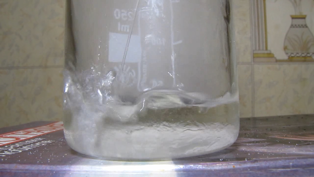 Reaction of nitric acid and potassium hydroxide (concentrated solutions).       ( )