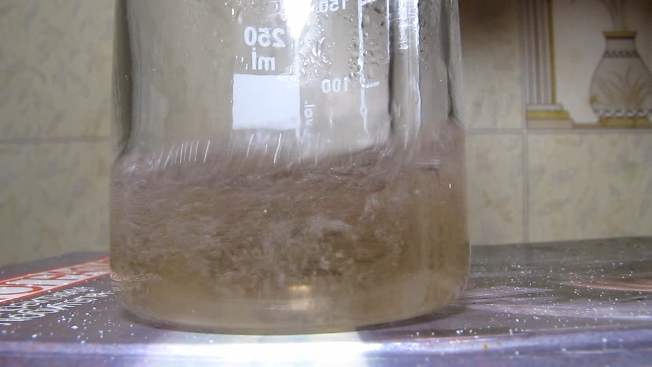 Reaction of nitric acid and potassium hydroxide (concentrated solutions).       ( )