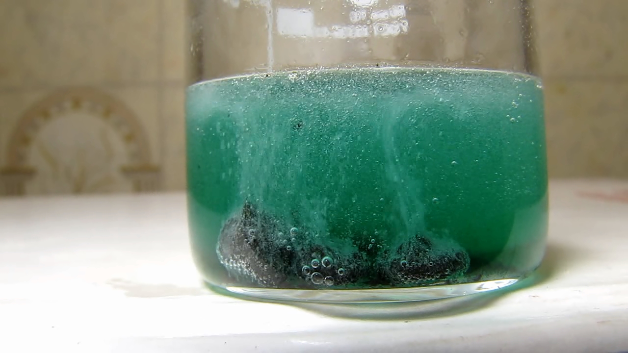 Reaction of copper citrate with zinc metal