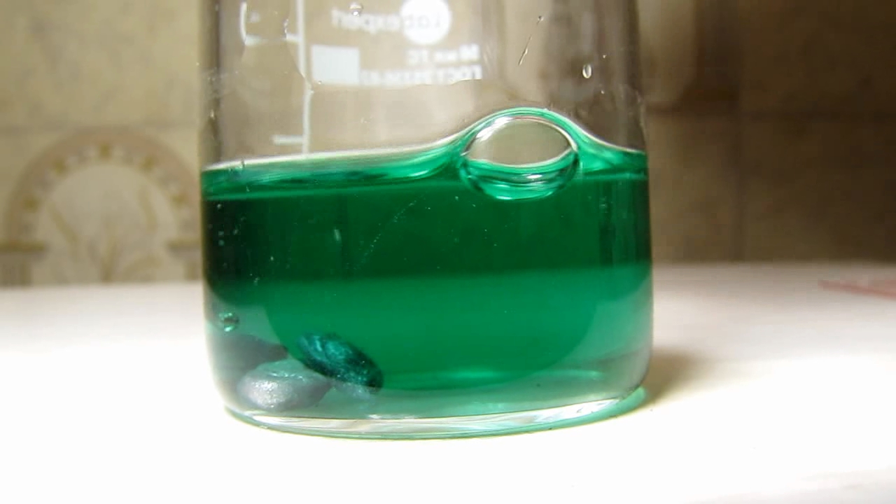 Reaction of copper citrate with zinc metal