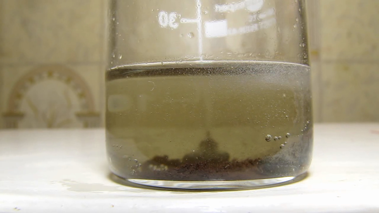 Reaction of copper citrate with zinc metal