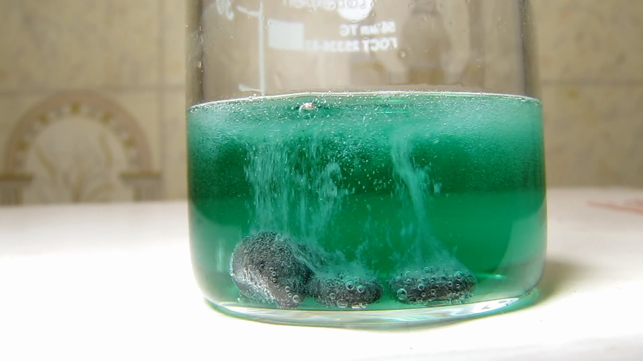 Reaction of copper citrate with zinc metal