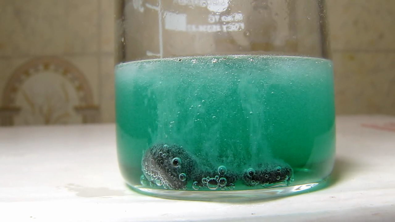 Reaction of copper citrate with zinc metal
