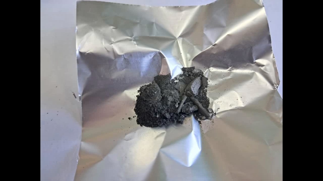 Titanium hydride and ammonium perchlorate