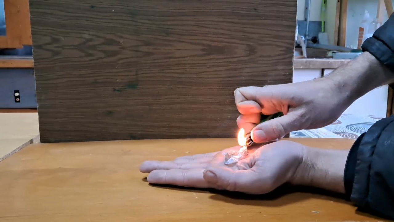 Fire on Hand (Combustion of Nitrocellulose Film)