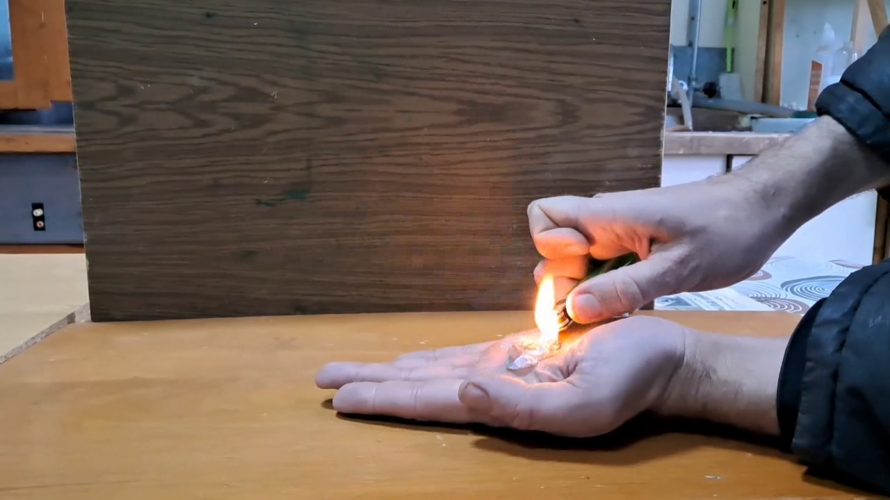 Fire on Hand (Combustion of Nitrocellulose Film)