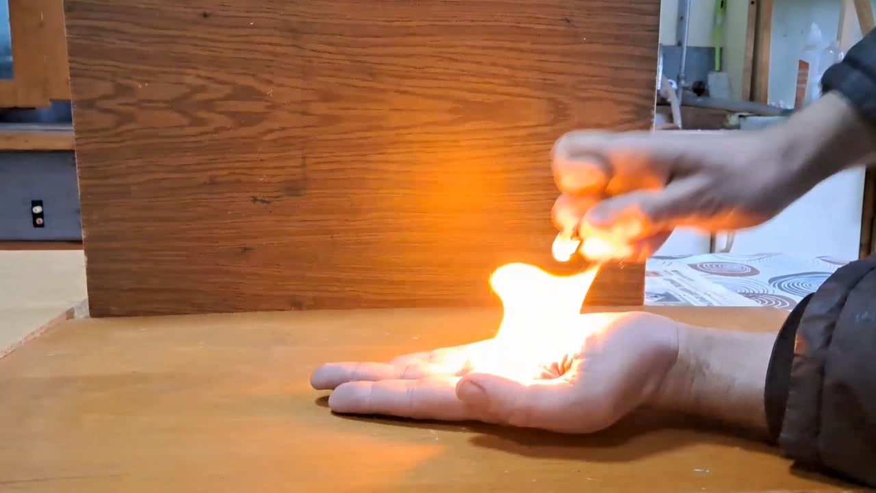 Fire on Hand (Combustion of Nitrocellulose Film)