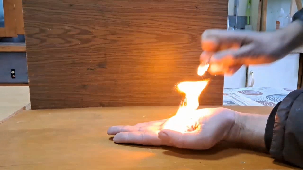 Fire on Hand (Combustion of Nitrocellulose Film)