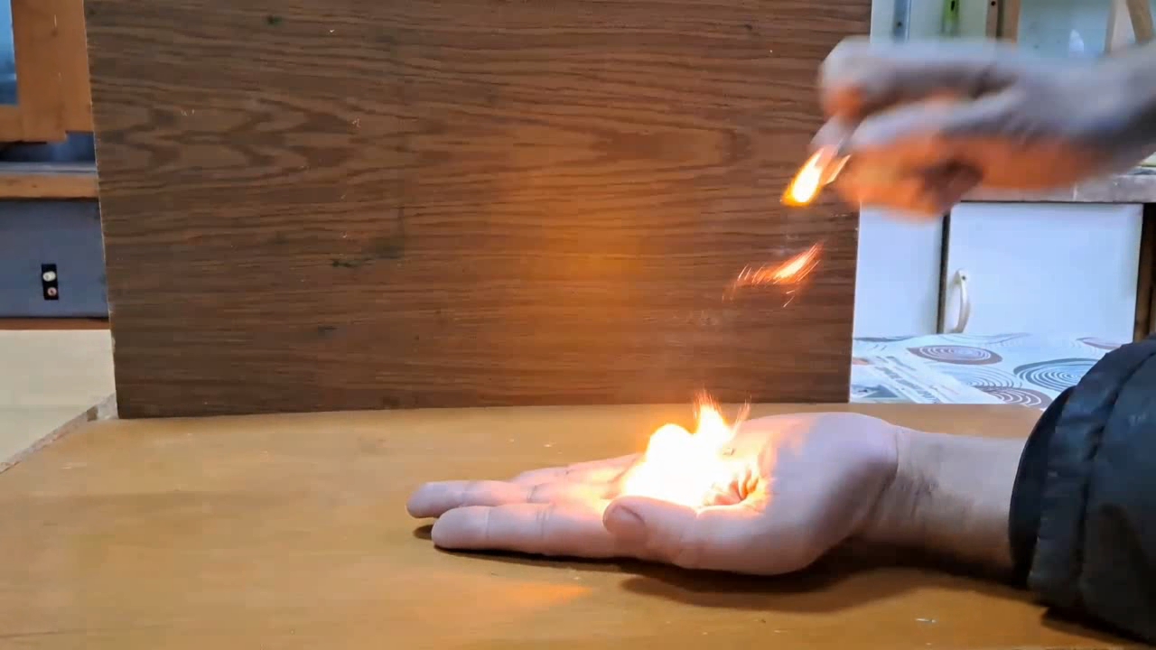 Fire on Hand (Combustion of Nitrocellulose Film)