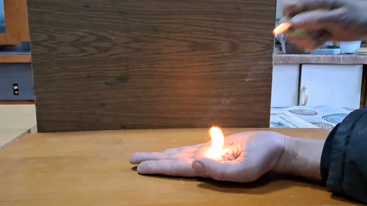 Fire on Hand (Combustion of Nitrocellulose Film)