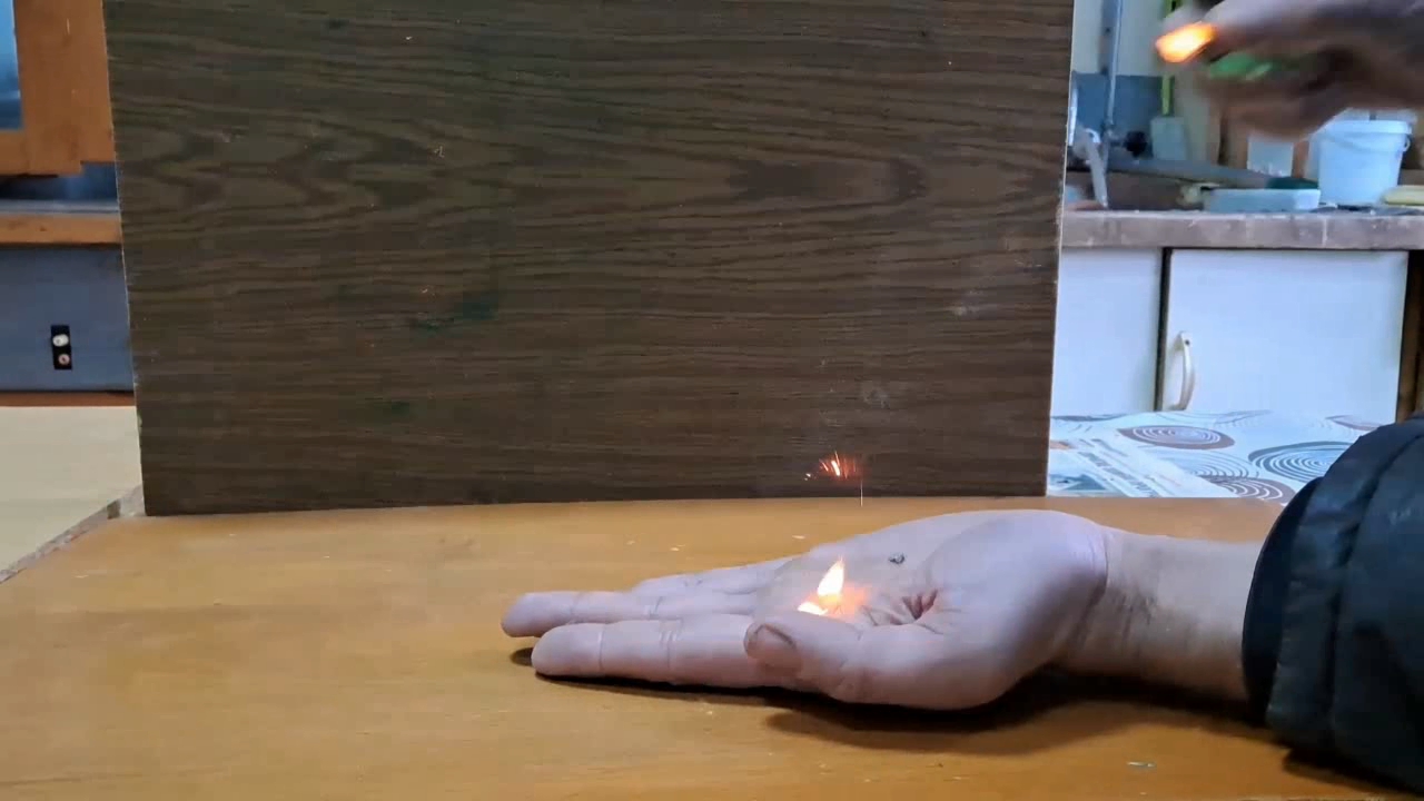 Fire on Hand (Combustion of Nitrocellulose Film)
