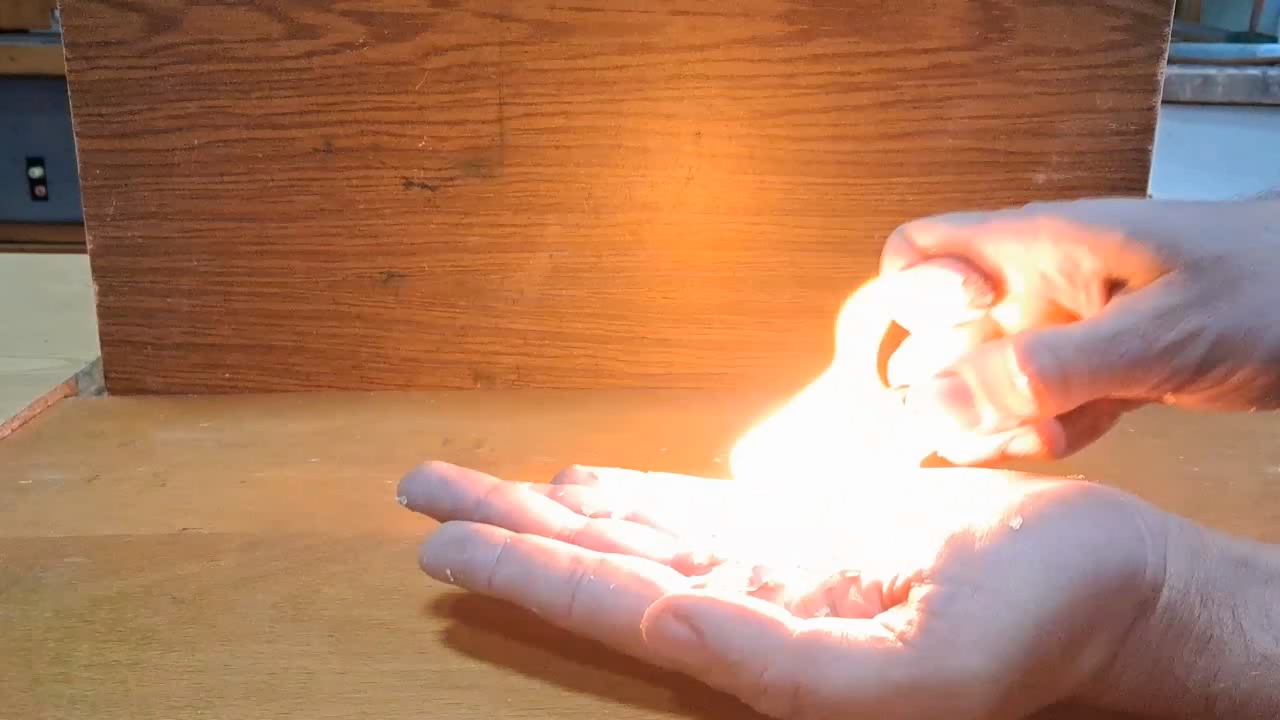 Fire on Hand (Combustion of Nitrocellulose Film)