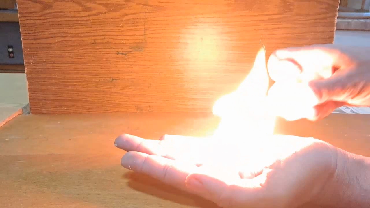 Fire on Hand (Combustion of Nitrocellulose Film)