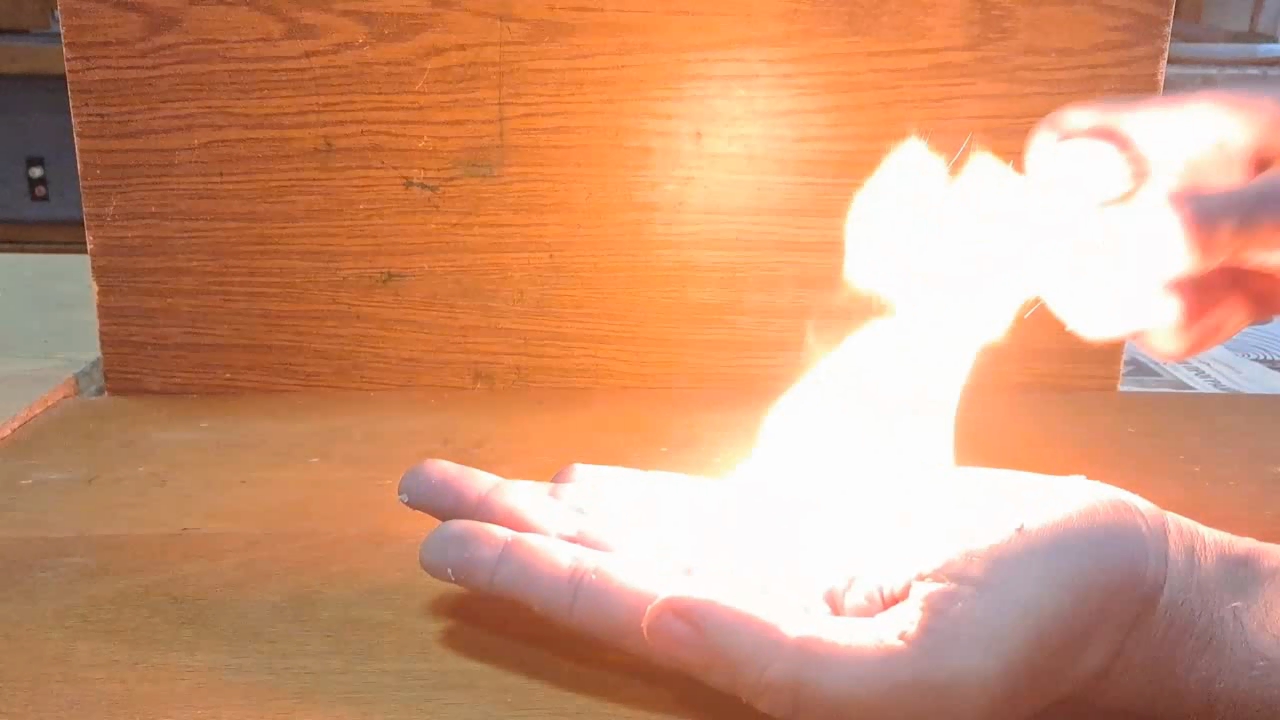 Fire on Hand (Combustion of Nitrocellulose Film)