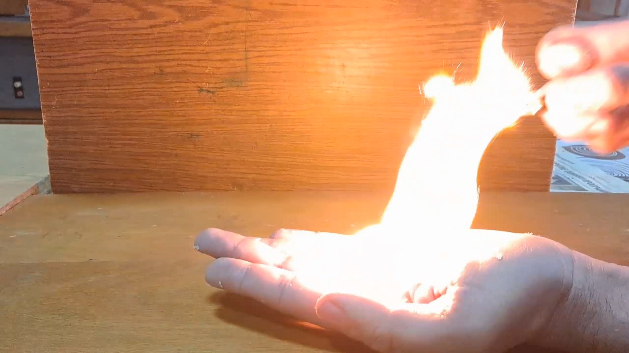 Fire on Hand (Combustion of Nitrocellulose Film)