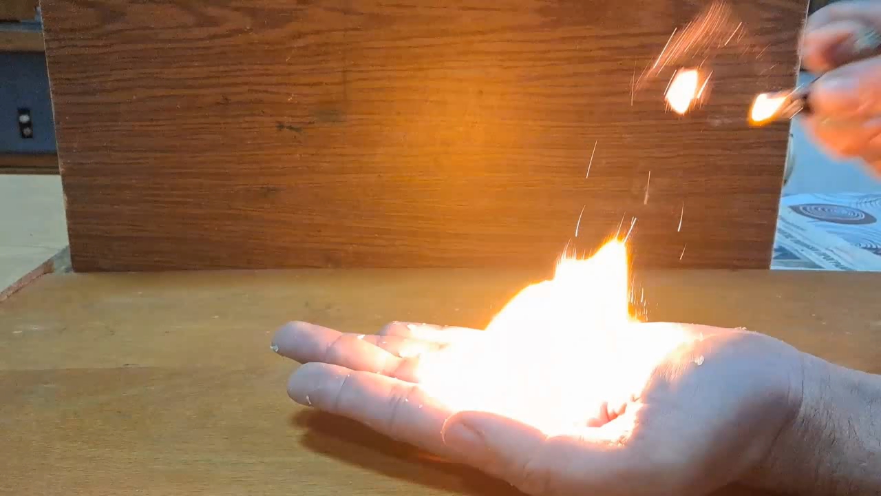Fire on Hand (Combustion of Nitrocellulose Film)