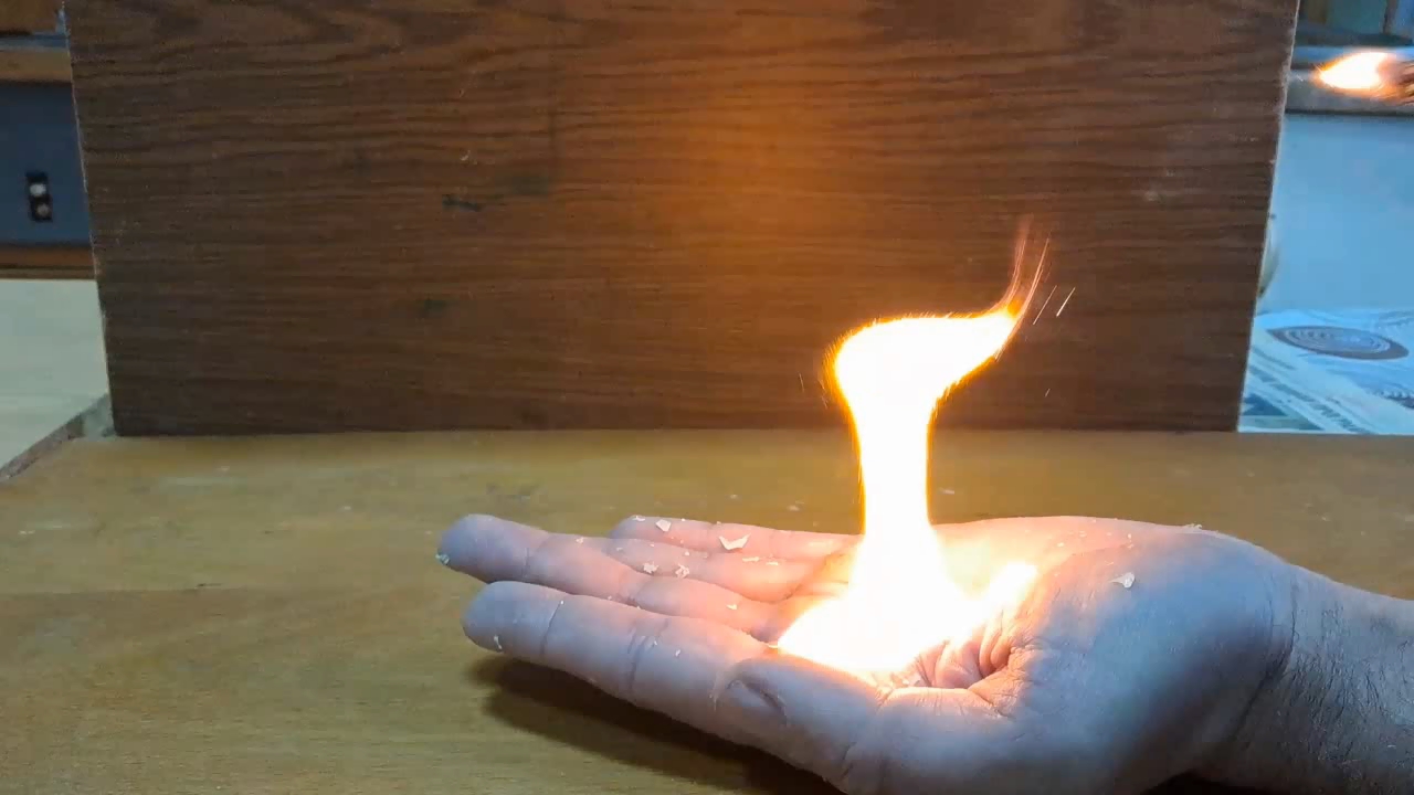 Fire on Hand (Combustion of Nitrocellulose Film)