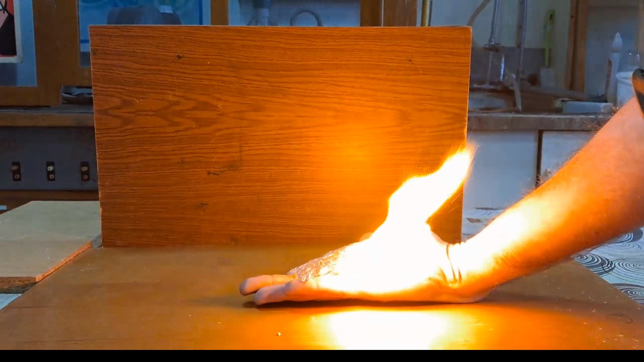 Fire on Hand (Combustion of Nitrocellulose Film)