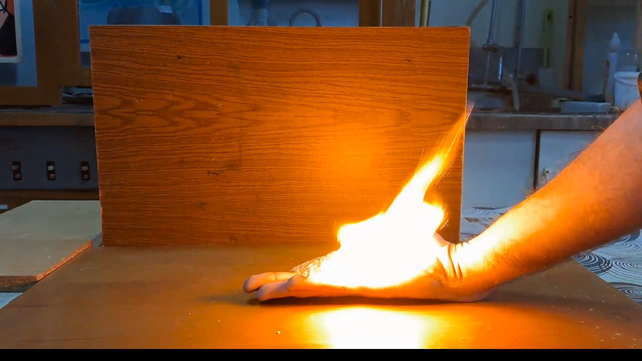 Fire on Hand (Combustion of Nitrocellulose Film)