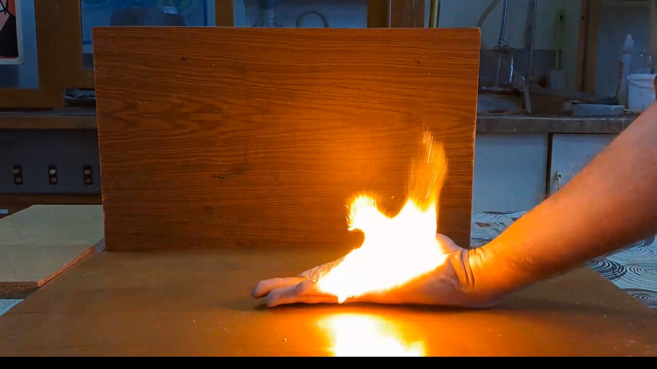 Fire on Hand (Combustion of Nitrocellulose Film)