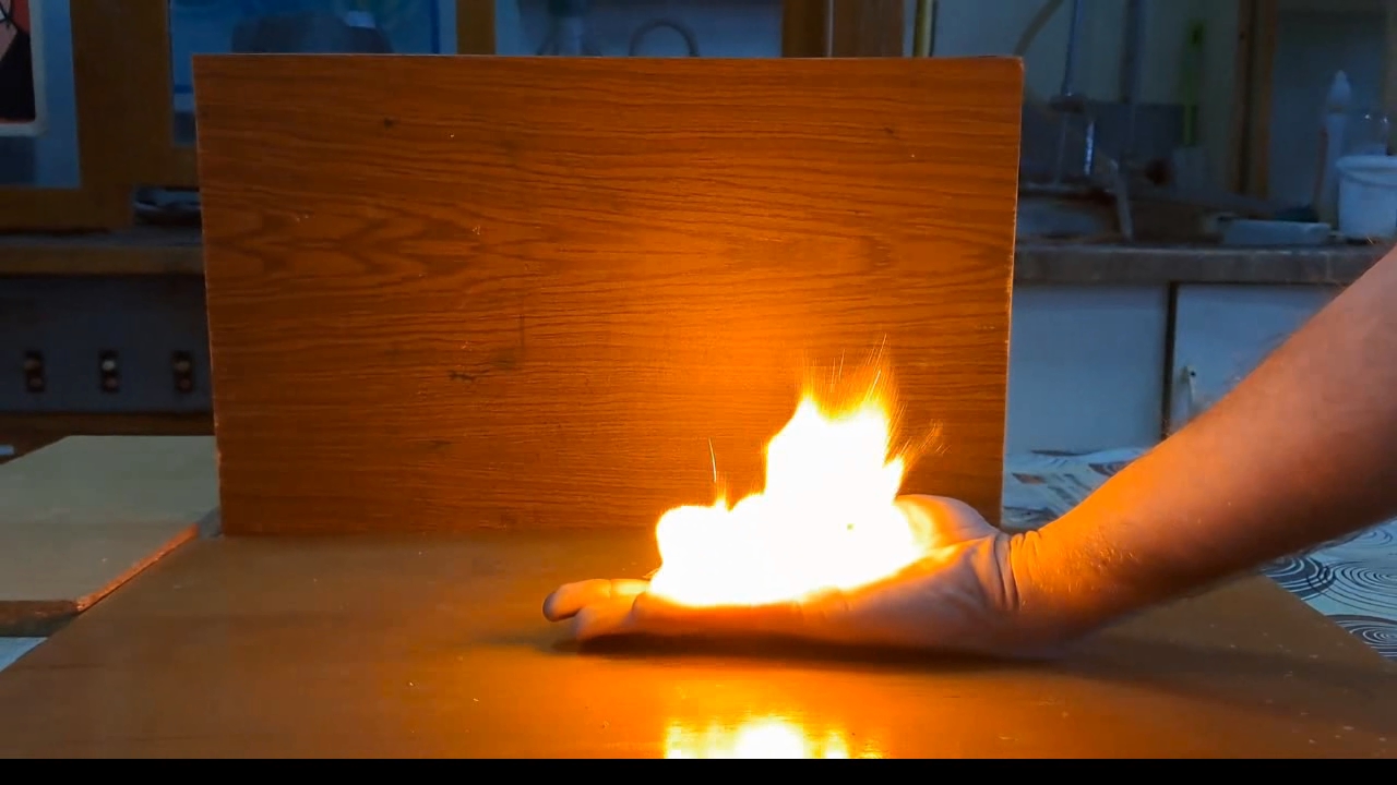 Fire on Hand (Combustion of Nitrocellulose Film)