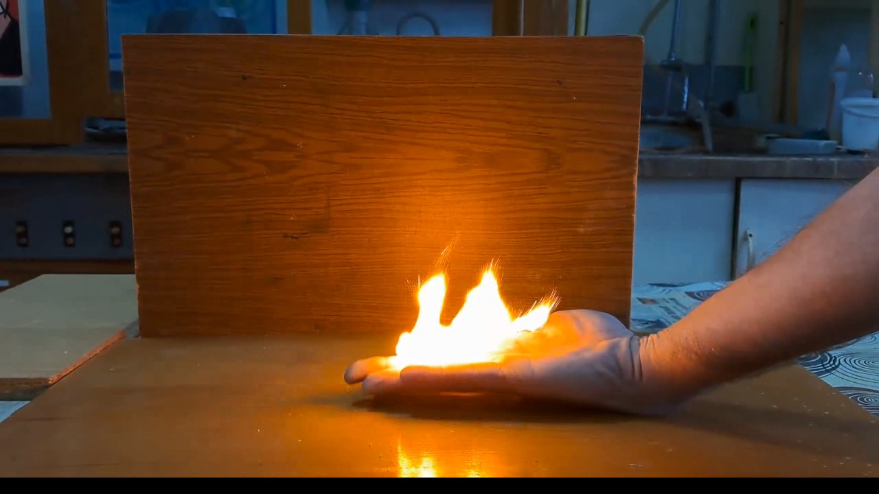 Fire on Hand (Combustion of Nitrocellulose Film)