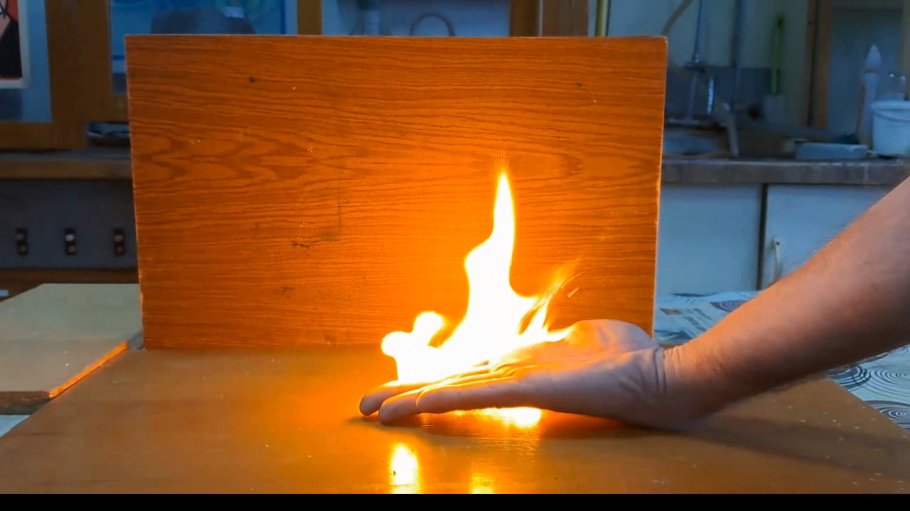 Fire on Hand (Combustion of Nitrocellulose Film)
