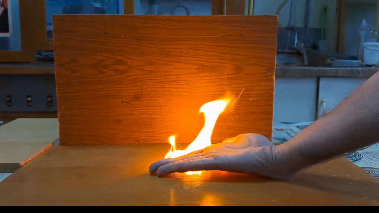 Fire on Hand (Combustion of Nitrocellulose Film)
