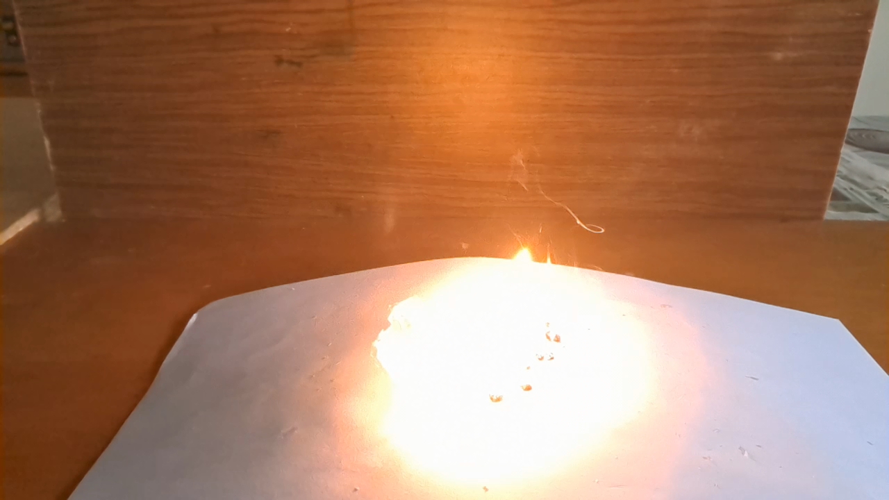 Fire on Hand (Combustion of Nitrocellulose Film)