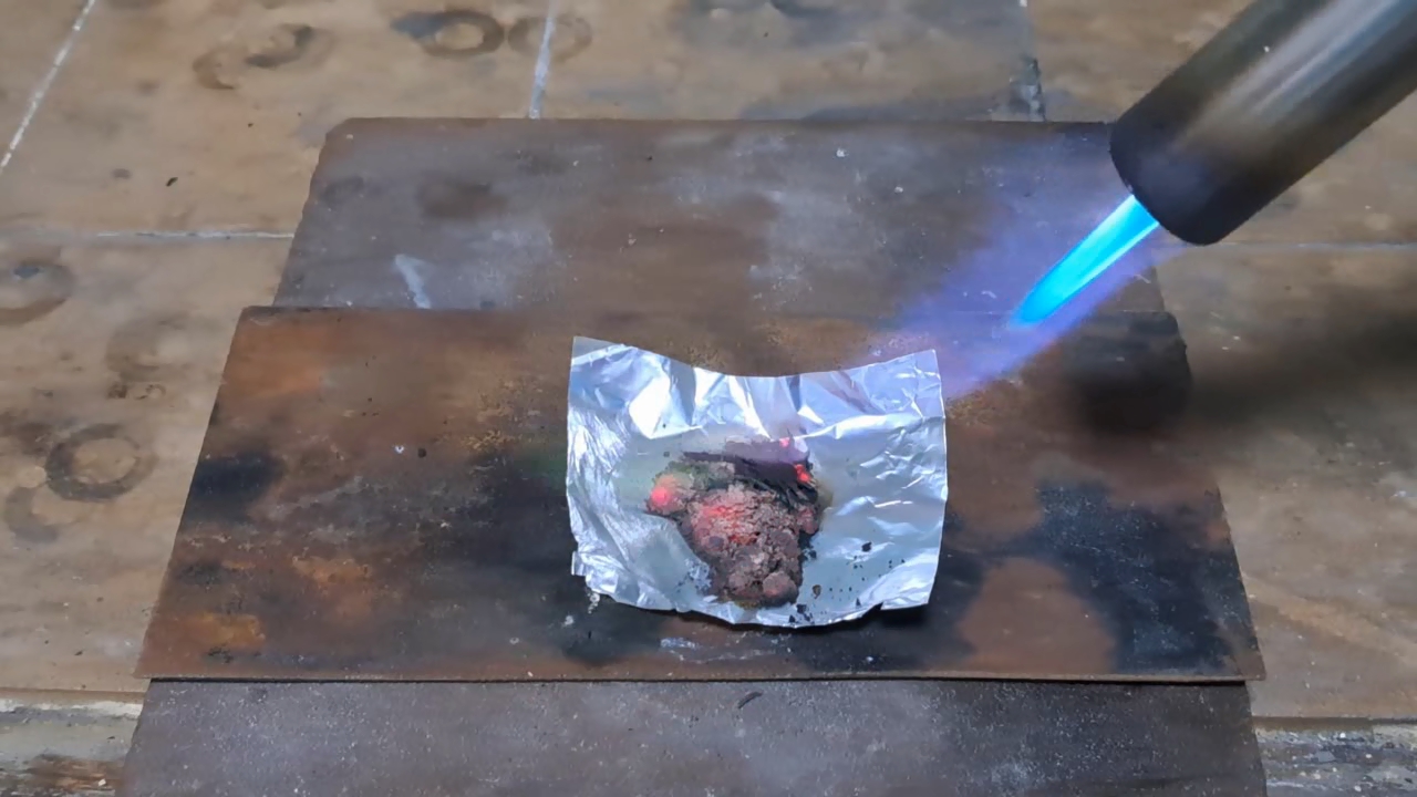 Copper Nitrate, Charcoal, and Flame
