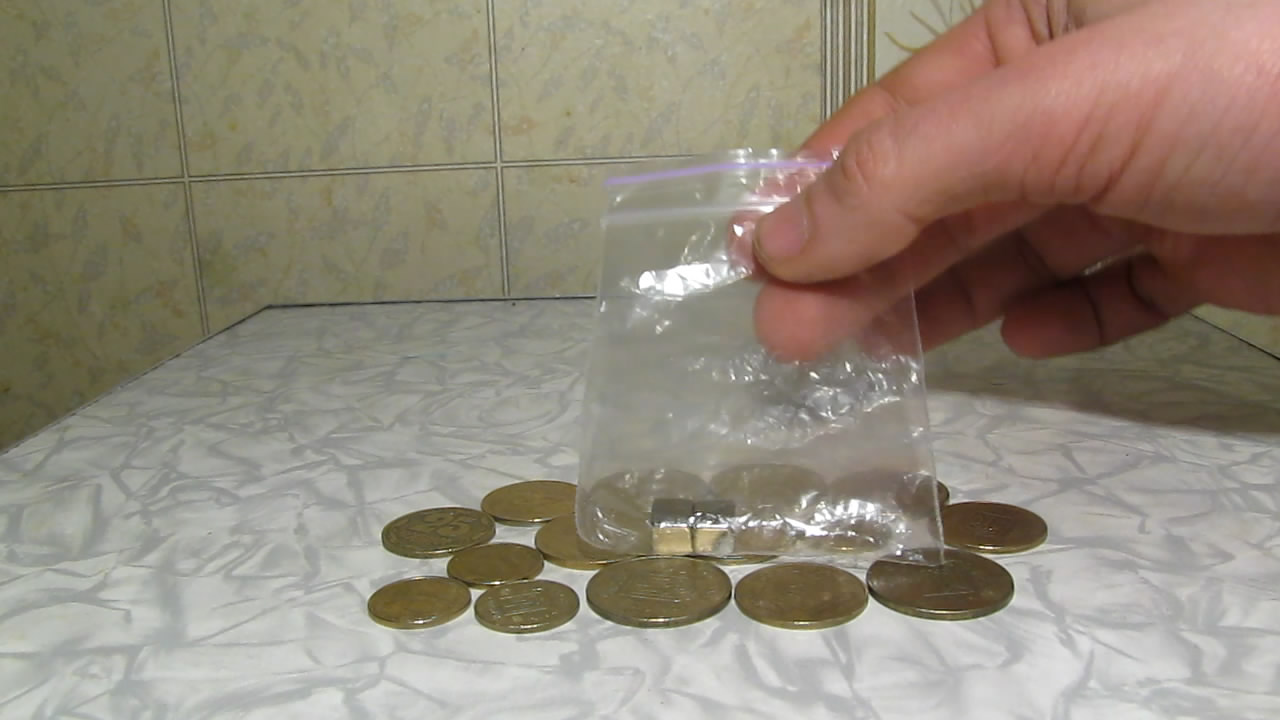    . Ukrainian coins and magnet