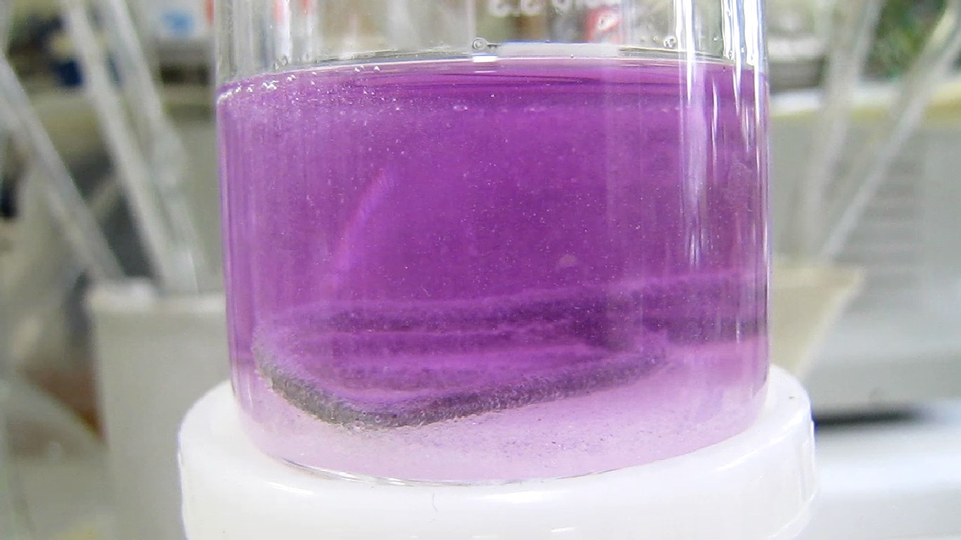         . Reduction of potassium permanganate by aluminium and lithium hydroxide