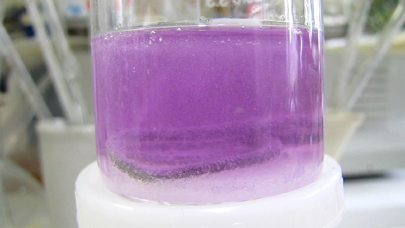         . Reduction of potassium permanganate by aluminium and lithium hydroxide