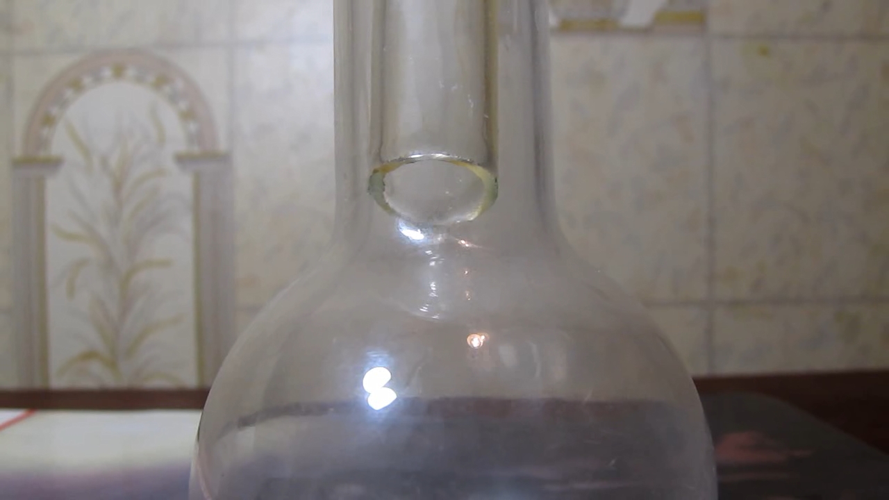 Aluminium hydroxide (after ageing of precipitate) and acetic acid