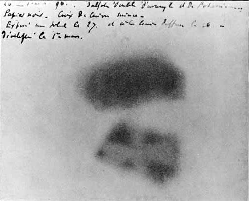 Becquerel's photographic plate which has been fogged by exposure to radiation from a uranium salt. The shadow of a metal Maltese Cross placed between the plate and the uranium salt is clearly visible