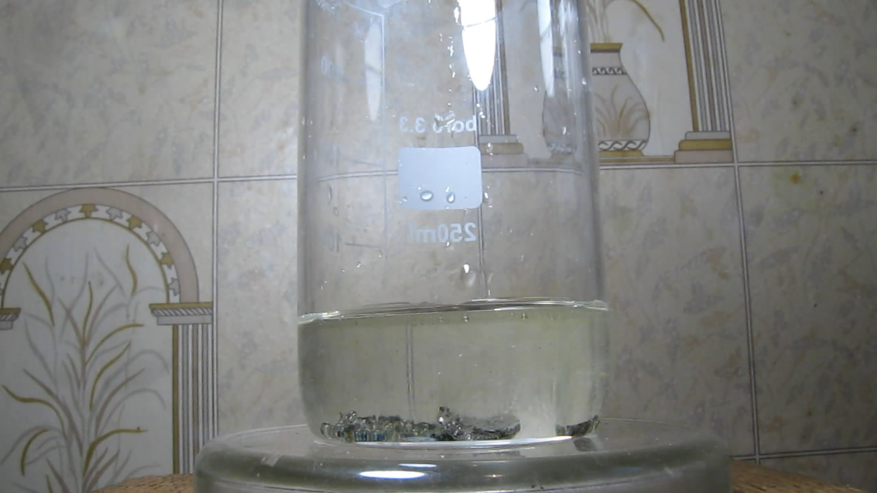      ('' '')   . Reaction of alloy of nickel and phosphorus (''nickel phosphide'') with nitric acid