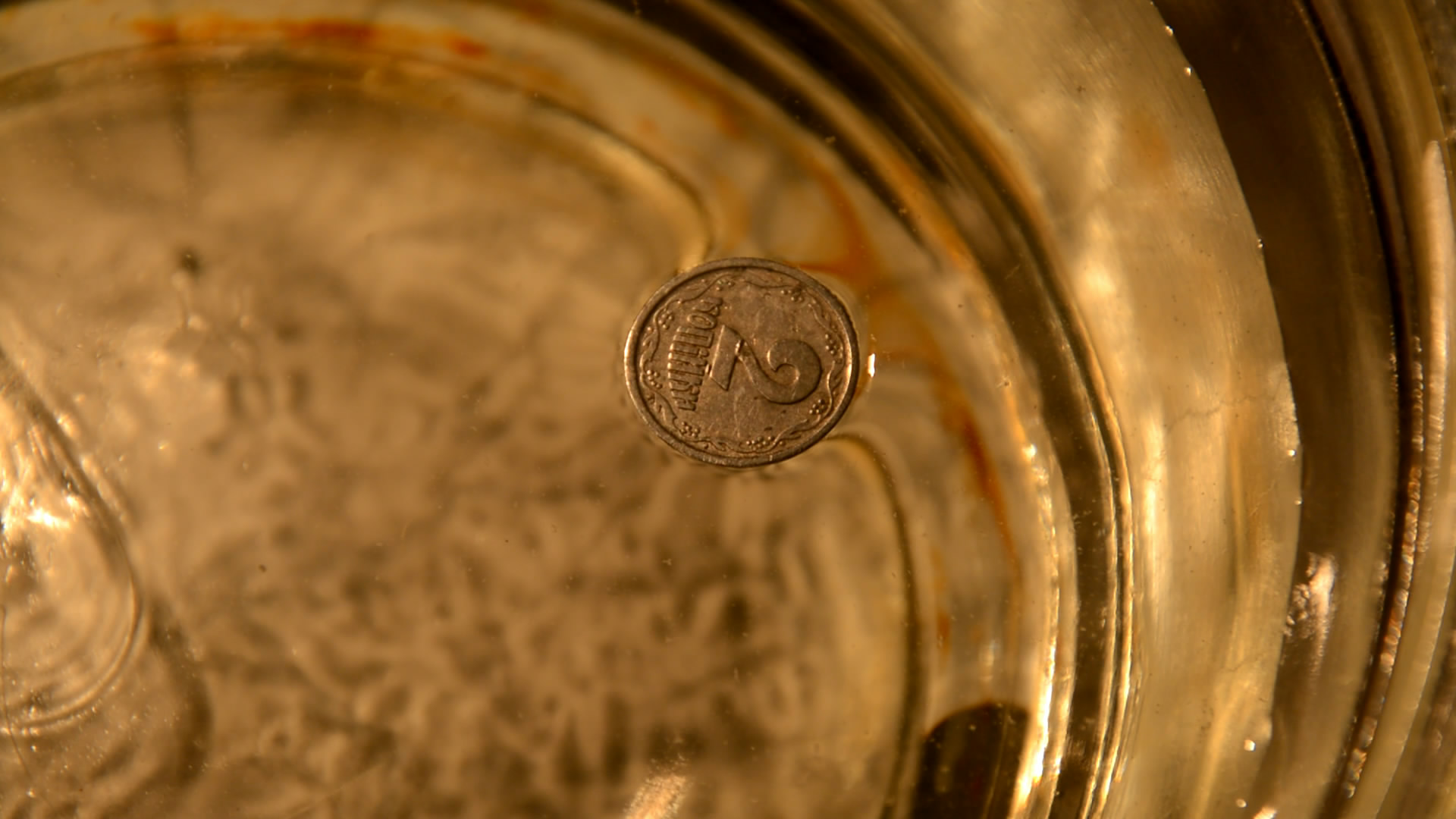     . Floating coin (surface tension)