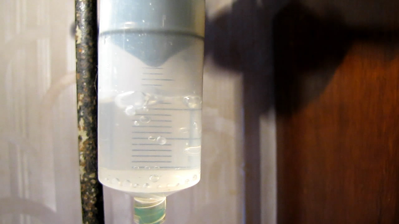     . Boiling of ammonia solution (aqueous ammonia) in vacuum