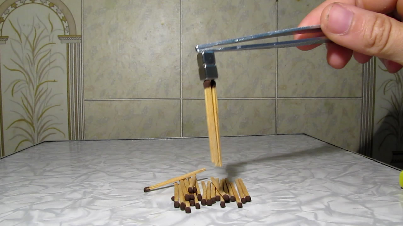    . Matches and neodymium magnet