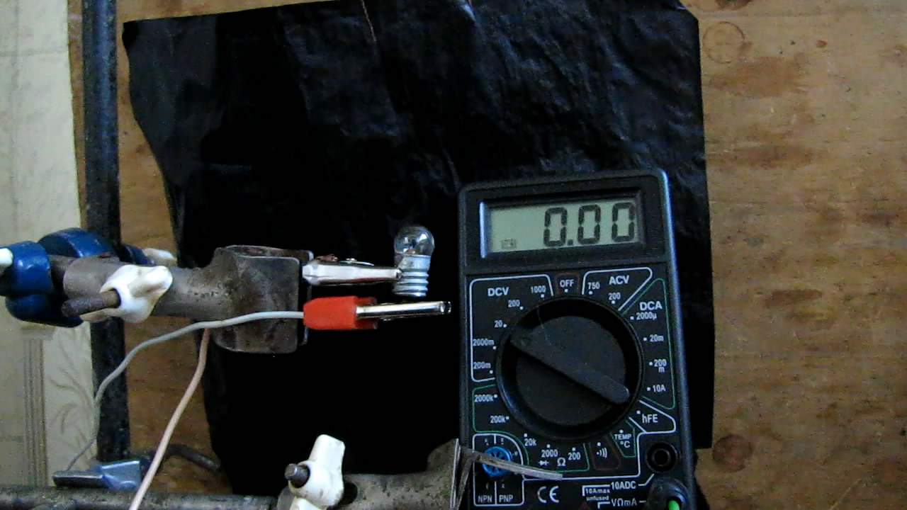    3.5       220 . 3.5-volt incandescent lamp was plugged into mains with voltage of 220 V (AC)